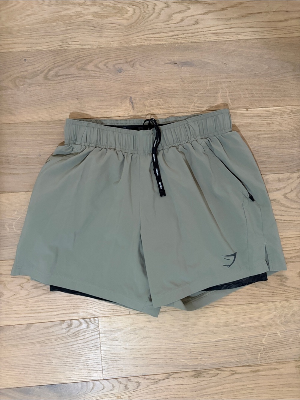 Gymshark Sage Green Athletic Shorts with Black Drawcord